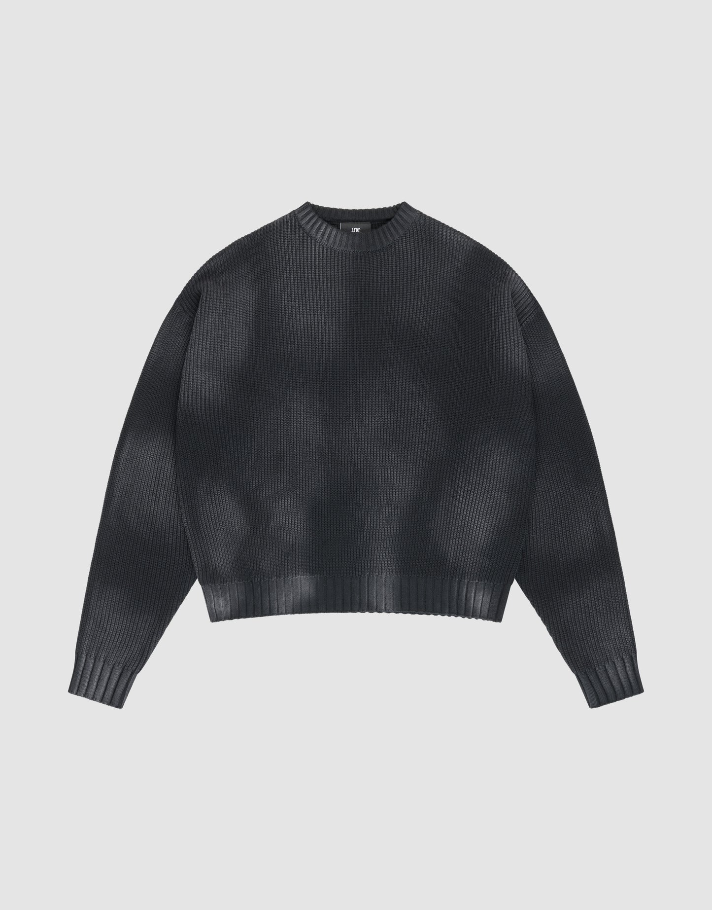The LFDY Washed Knit Sweater by LIVE FAST DIE YOUNG is a dark gray, ribbed, crew neck sweater with long wide sleeves, a slightly cropped oversize fit, and is made from 100% Baumwolle for comfort.