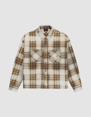 The Faded Flannel by LIVE FAST DIE YOUNG is an oversize fit, long-sleeve button-up with brown, beige, and white plaid, two chest pockets (one with a red tag), made from 100% Baumwolle and shown on a plain white background. | plain