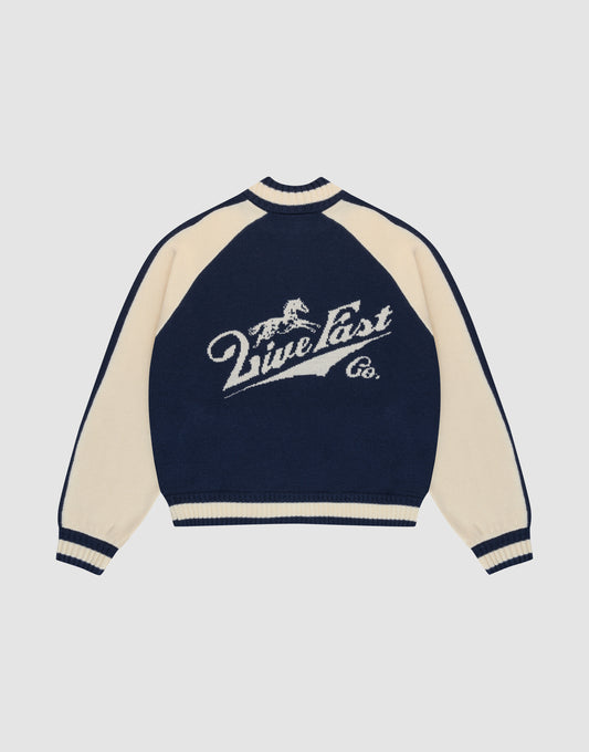 A navy blue and cream Boxy Knit Zip Jacket by LIVE FAST DIE YOUNG, with oversized fit, long raglan sleeves, and a large intarsia-knit running horse graphic above "Live Fast Co." script on the back. | plain