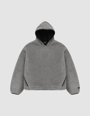 The LFDY Teddy Hooded by LIVE FAST DIE YOUNG is a gray, long-sleeve, oversized hoodie with soft fleece-like material and practical pockets, shown flat on a light gray background. | plain
