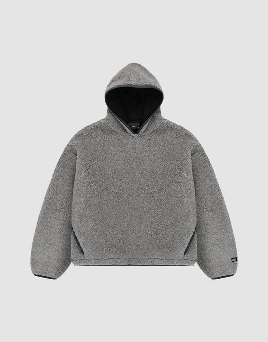 The LFDY Teddy Hooded by LIVE FAST DIE YOUNG is a gray, long-sleeve, oversized hoodie with soft fleece-like material and practical pockets, shown flat on a light gray background. | plain