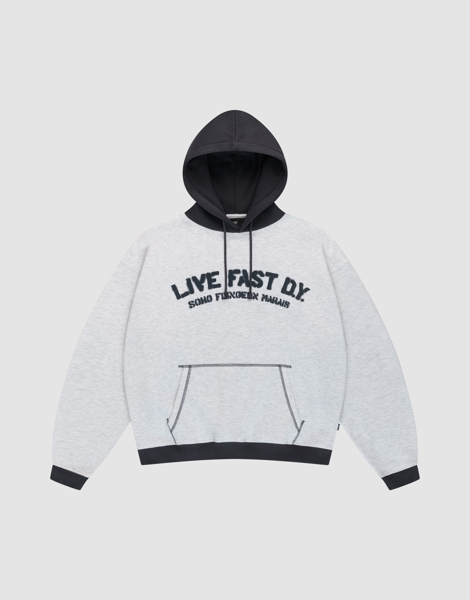 The LFDY District Hooded by LIVE FAST DIE YOUNG features a light gray oversize fit, black contrast hood, cuffs, waistband, bold "LIVE FAST D.I.Y. SQUAD PHILOSOPHIE PHALANS" front print, kangaroo pocket, and matching black drawstrings.