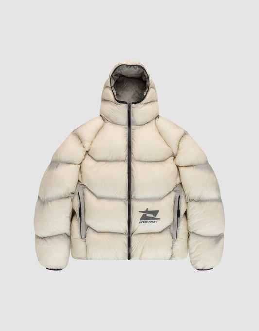 The Live Fast Puffer Jacket by LIVE FAST DIE YOUNG is cream-colored, oversize fit, with a hood, front zipper, two side pockets, and LIVE FAST logo plus reflective graphic prints on front and back. Shaded edges add a distinctive touch. | plain