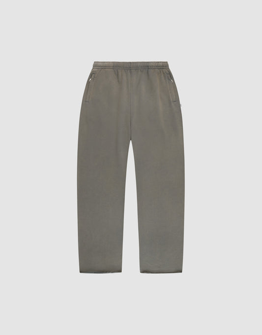 LFDY Ripped Sweatpants by LIVE FAST DIE YOUNG in gray with a wide fit, made from soft cotton, featuring an elastic waistband and side pockets, shown flat on a plain light gray background. | plain