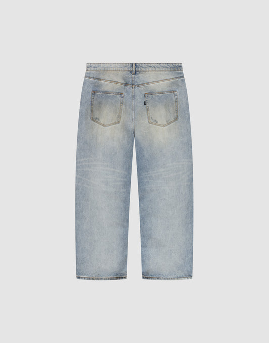Back view of LIVE FAST DIE YOUNG’s LFDY Baggy Denim in light blue. These straight-leg jeans feature two back pockets, subtle fading, and a relaxed baggy fit, shown laid flat on a plain light background.