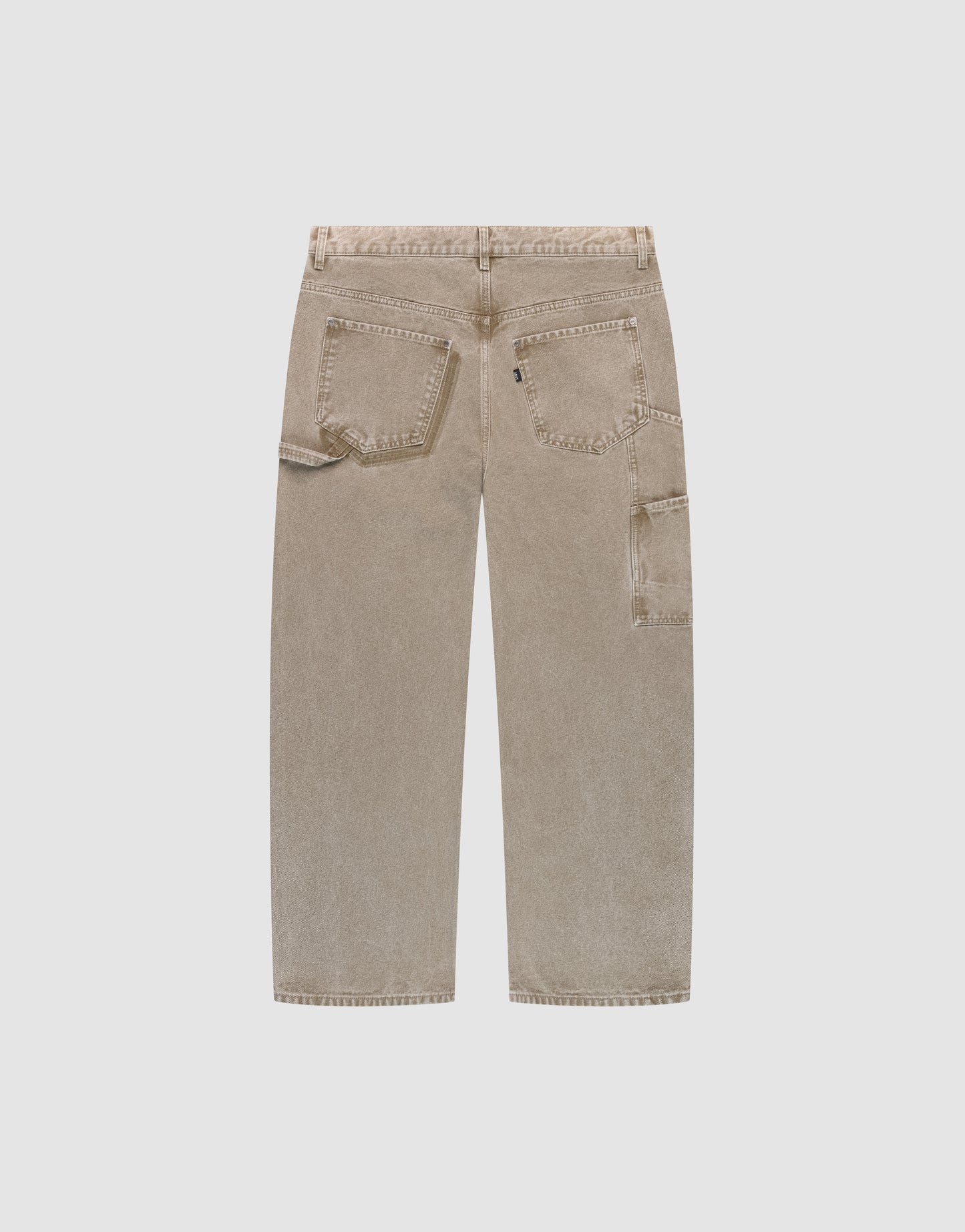 The Faded Carpenter Pants by LIVE FAST DIE YOUNG feature a beige, wide-leg baggy fit, two rear pockets, and a side utility pocket for a classic carpenter style, shown from the back on a light grey background.
