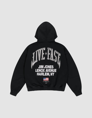 The Live Fast Lenox Hooded Zip by LIVE FAST DIE YOUNG is a black oversized zip hoodie featuring metallic "LIVE FAST" on the back, "JIM JONES LENOX AVENUE HARLEM, NY" prints front and back, plus a small American flag below. | plain