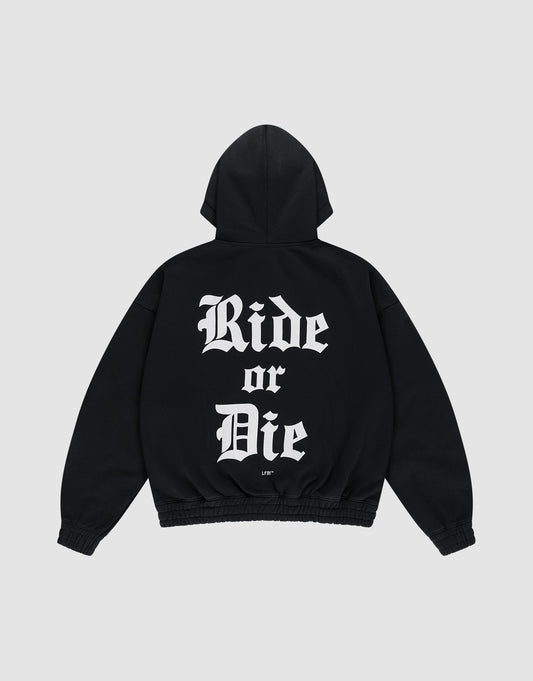 The Ride or Die Hooded Zip by LIVE FAST DIE YOUNG is a black oversized hoodie with a double-layer hood and "Ride or Die" in bold white Gothic lettering across the back. | plain