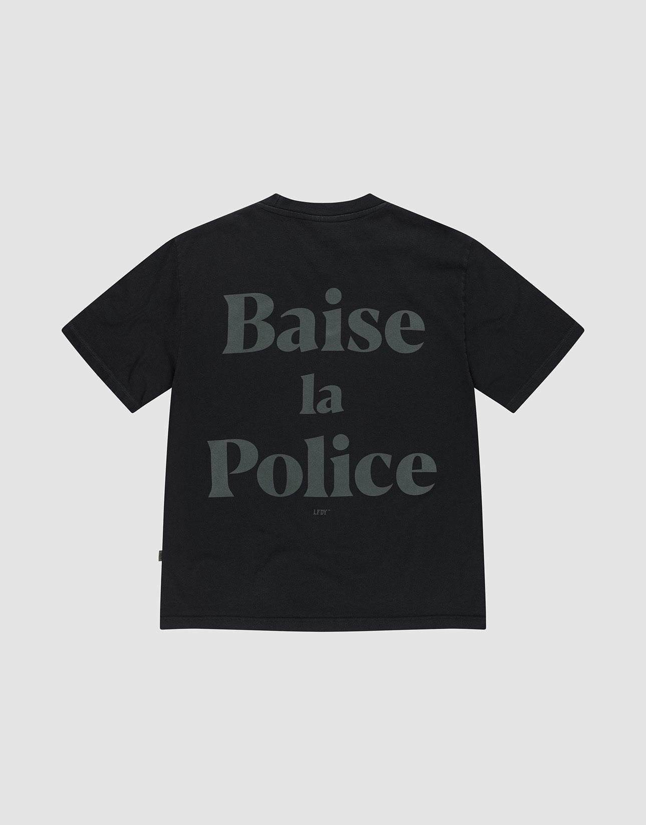The LFDY BLP Tee by LIVE FAST DIE YOUNG features "Baise la Police" in large gray letters on the back, made from 100% cotton (Baumwolle), and is shown on a plain light gray background.