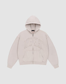 The Ripped College Hooded Zip by LIVE FAST DIE YOUNG is a beige oversized zip-up hoodie with a hood, front pockets, and large distressed "LIVE FAST" embroidery on the chest, shown against a plain white background.| plain