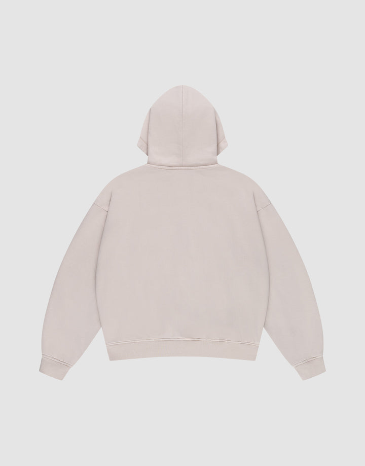 The LIVE FAST DIE YOUNG Ripped College Hooded Zip in Oversize Fit is shown flat from the back, featuring long sleeves, a hood, and ribbed cuffs and hem. Made from 100% Baumwolle for comfort. Color: plain light beige.