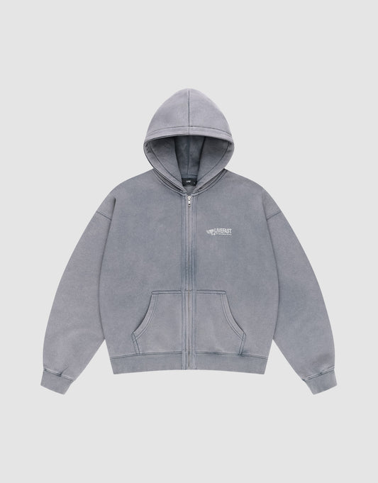 The LFDY Protection Hooded Zip by LIVE FAST DIE YOUNG is a light gray zip-up hoodie with a front pocket, Kapuze, subtle Herringbonetape accents, and a small white LIFEMART logo on the left chest, shown on a plain white background.