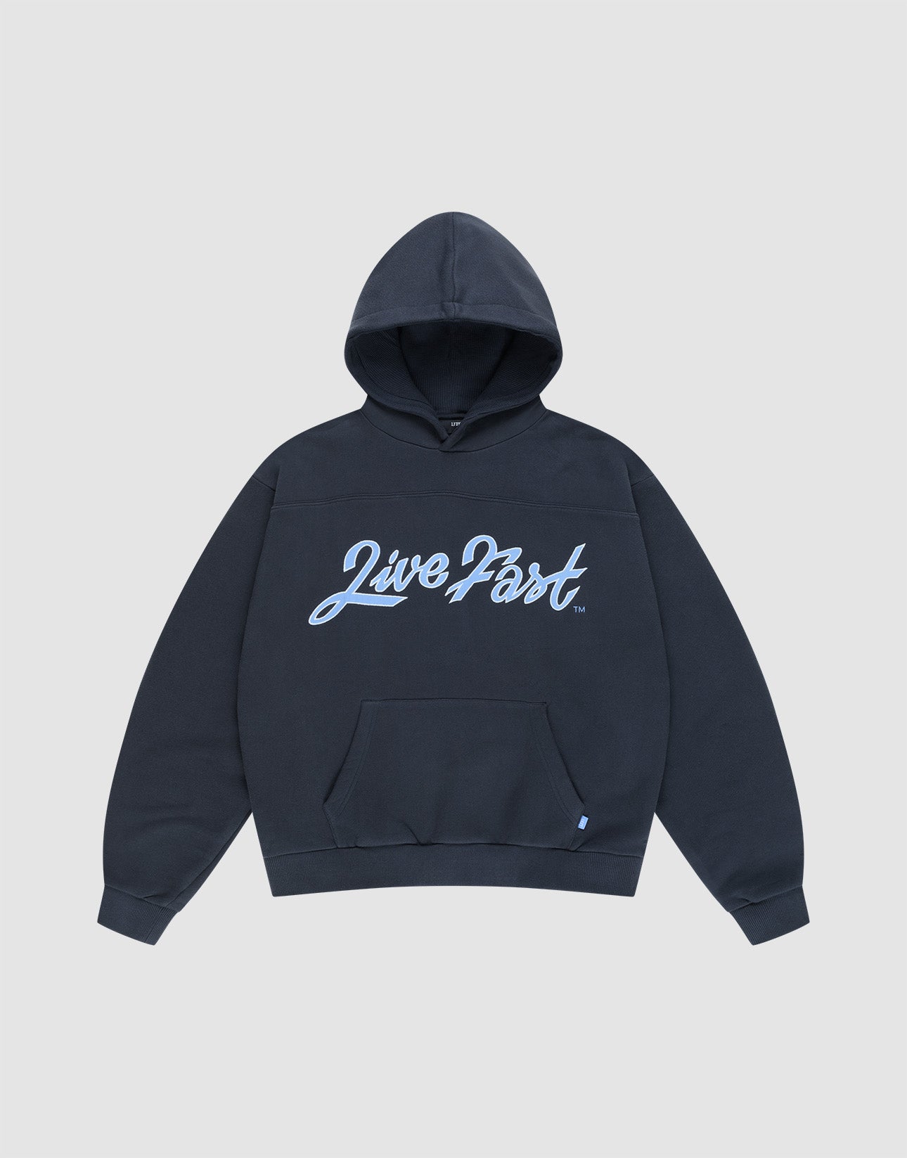 The LFDY Script Hooded by LIVE FAST DIE YOUNG features a dark navy oversize fit, front pouch pocket, bold light blue "Live Fast" script on the chest, and distressed effects, shown against a plain light gray backdrop. | plain