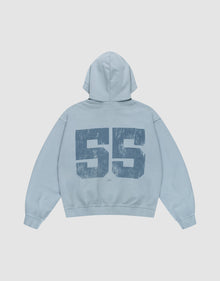 The LIVE FAST DIE YOUNG LFDY 55 Hooded Zip in light blue features a large distressed dark blue "55" on the back, an oversize fit, and vintage Waschung for a relaxed retro look. | plain