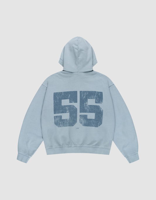 The LIVE FAST DIE YOUNG LFDY 55 Hooded Zip in light blue features a large distressed dark blue "55" on the back, an oversize fit, and vintage Waschung for a relaxed retro look. | plain