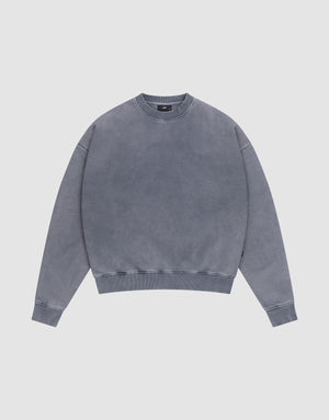 The LIVE FAST DIE YOUNG Basic Blank Sweater, a washed gray, long-sleeve crewneck in Baumwolle, is laid flat on a light background, showcasing its simple vintage-washed style and casual design. | plain