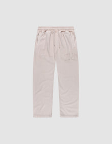 The Ripped College Wide Jogger by LIVE FAST DIE YOUNG features a wide fit, elastic waistband with drawstring, side pockets, and CUTE AF embroidery on soft Baumwolle, shown in light beige against a plain white background. | plain