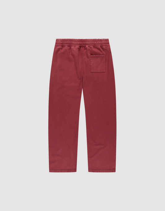Back view of LIVE FAST DIE YOUNG’s Live Fast London Wide Jogger in red, featuring wide fit, breitem Elastikbund, single back pocket, and soft Baumwolle fabric, shown on a plain light gray background.