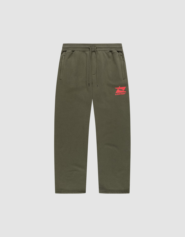 LIVE FAST DIE YOUNG Live Fast Sweatsuit Jogger in olive green features a wide fit, elastic waistband with drawstring, side pockets, and a red print on the upper left thigh, shown on a plain light grey background. | plain