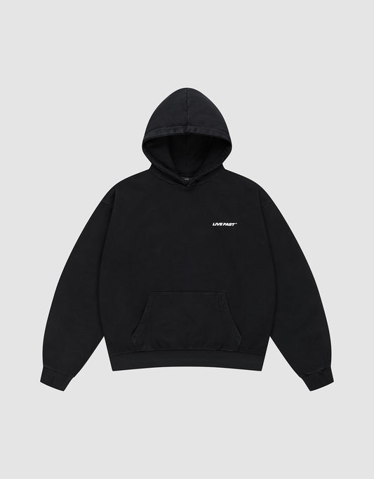 The LFDY Hardwear Hooded by LIVE FAST DIE YOUNG is a black oversized 100% Baumwolle sweatshirt with a front pocket and LIVE FAST in small white letters on the left chest, shown on a light gray background.