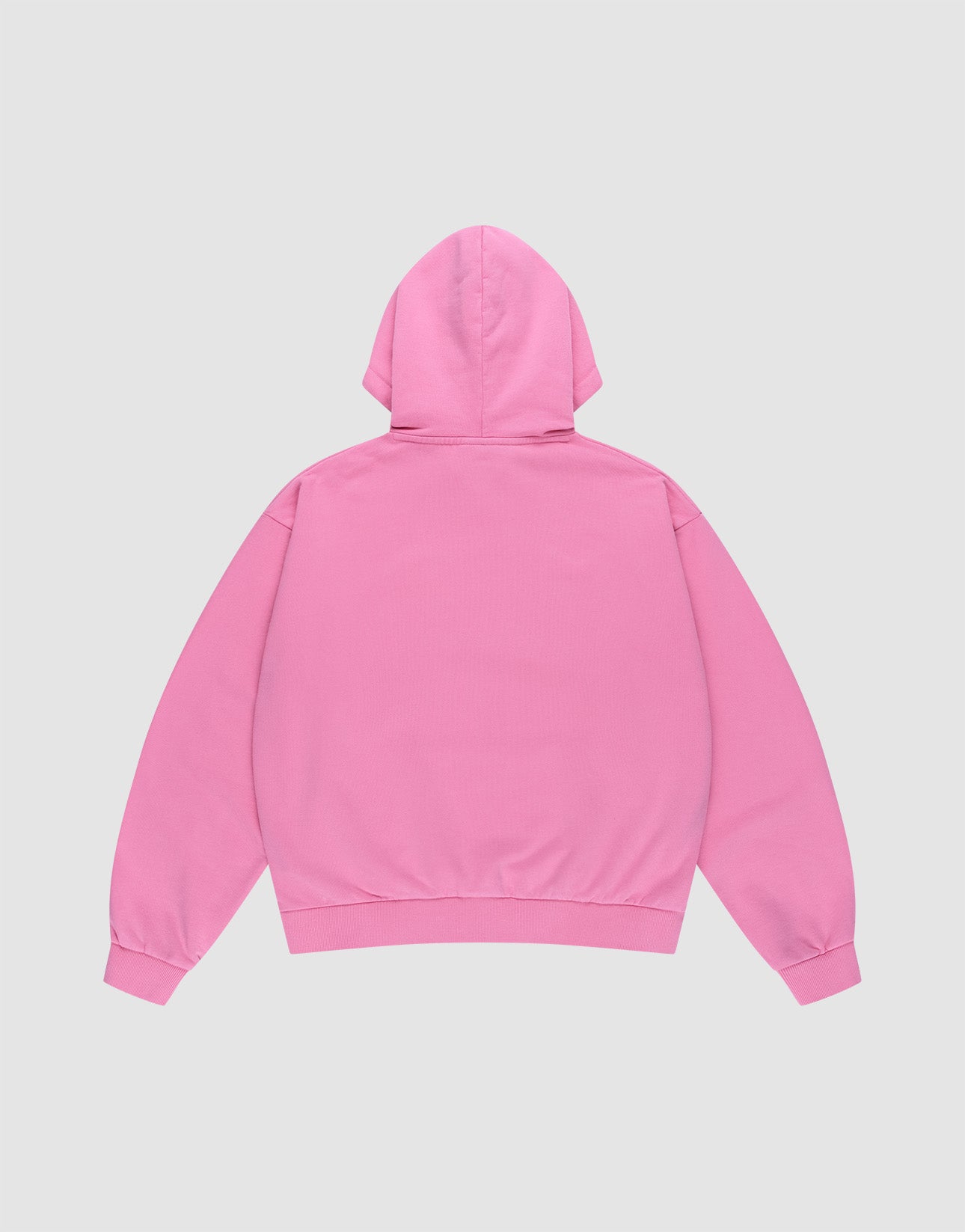 The Ripped College Hooded by LIVE FAST DIE YOUNG, shown flat with the back facing up, is an oversize pink hoodie featuring long sleeves, a hood, ribbed cuffs and hem, all set against a light gray background.