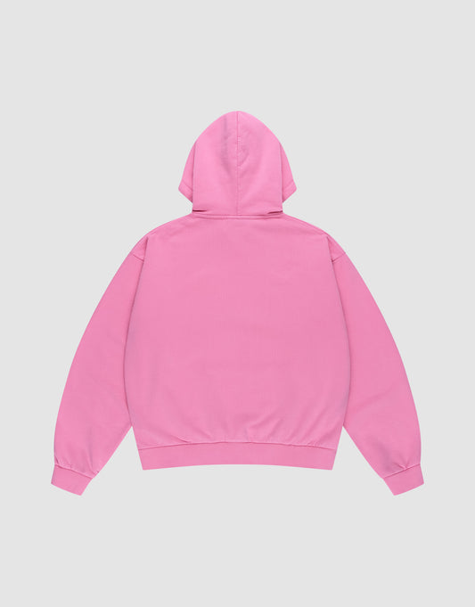 The Ripped College Hooded by LIVE FAST DIE YOUNG, shown flat with the back facing up, is an oversize pink hoodie featuring long sleeves, a hood, ribbed cuffs and hem, all set against a light gray background.