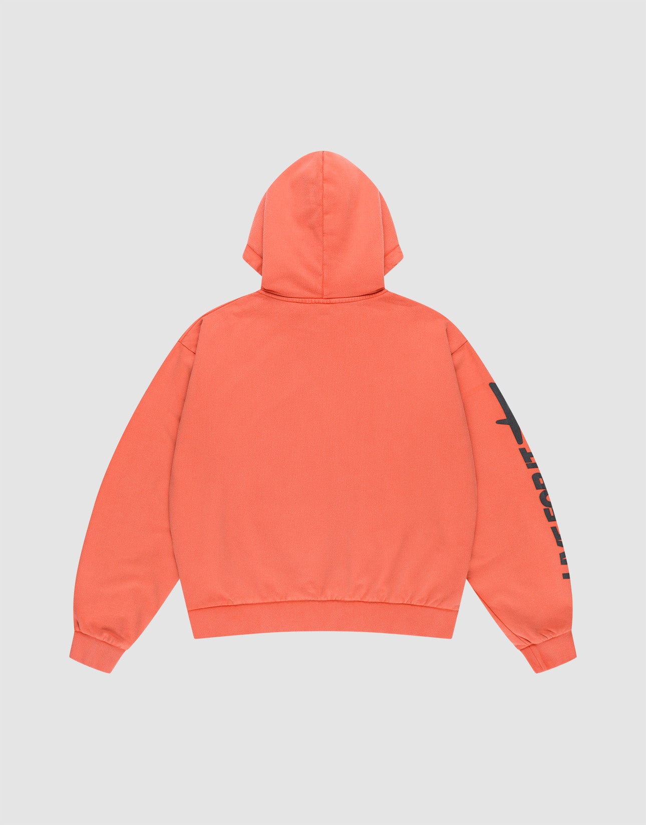 Back view of the LFDY Angel Hooded by LIVE FAST DIE YOUNG, an oversize coral hoodie made from 100% cotton, featuring partially visible black text on the right sleeve, displayed against a light gray background.