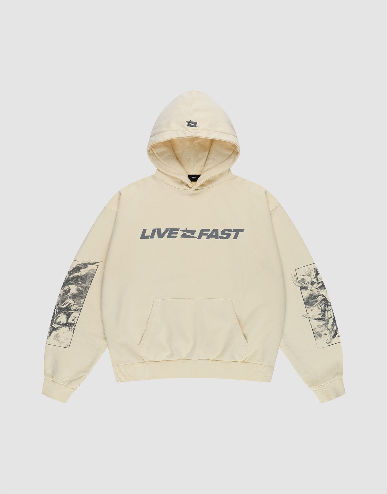 The LFDY Window Hooded by LIVE FAST DIE YOUNG is an oversized beige hoodie in 100% cotton, featuring "LIVE FAST" text with a small graphic, black reflective prints on both sleeves, a logo on the hood, and a front pocket.