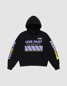 The LFDY Racing Hooded by LIVE FAST DIE YOUNG is a black oversized cotton hoodie with "LIVE FAST and Everything in it." printed in white and lavender on the front, plus bold glossy lavender and yellow graphics on both sleeves. | plain