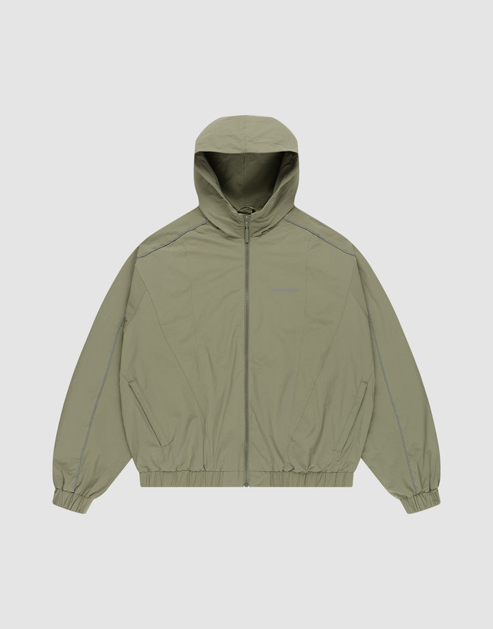 The LIVE FAST DIE YOUNG Live Fast Trackjacket is a light olive green hooded jacket with front zipper, elastic cuffs and waistband, regular fit, subtle shoulder and sleeve seams, and practical zip pockets. Shown on a plain white background. | plain