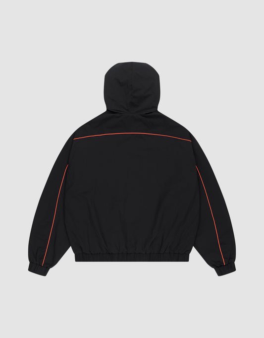 The LIVE FAST DIE YOUNG Live Fast Trackjacket in black Regular Fit is shown from the back with red piping on the sleeves and upper back, elastic cuffs and waistband, and zippered side pockets, against a plain light gray background.