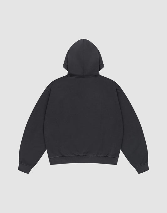 The Live Fast Box Hooded by LIVE FAST DIE YOUNG is a plain black hoodie, shown from the back on a light gray background. Made from a soft cotton-polyester blend, it has a hood, long sleeves, ribbed cuffs and hem, with no visible logos or designs.