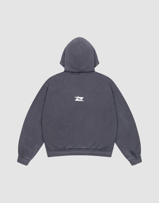 The LFDY Core Hooded by LIVE FAST DIE YOUNG is an Oversize Fit dark gray hoodie, shown flat with the back up. It features a small white abstract graphic on the upper back and is made from 100% Baumwolle for comfort and style.