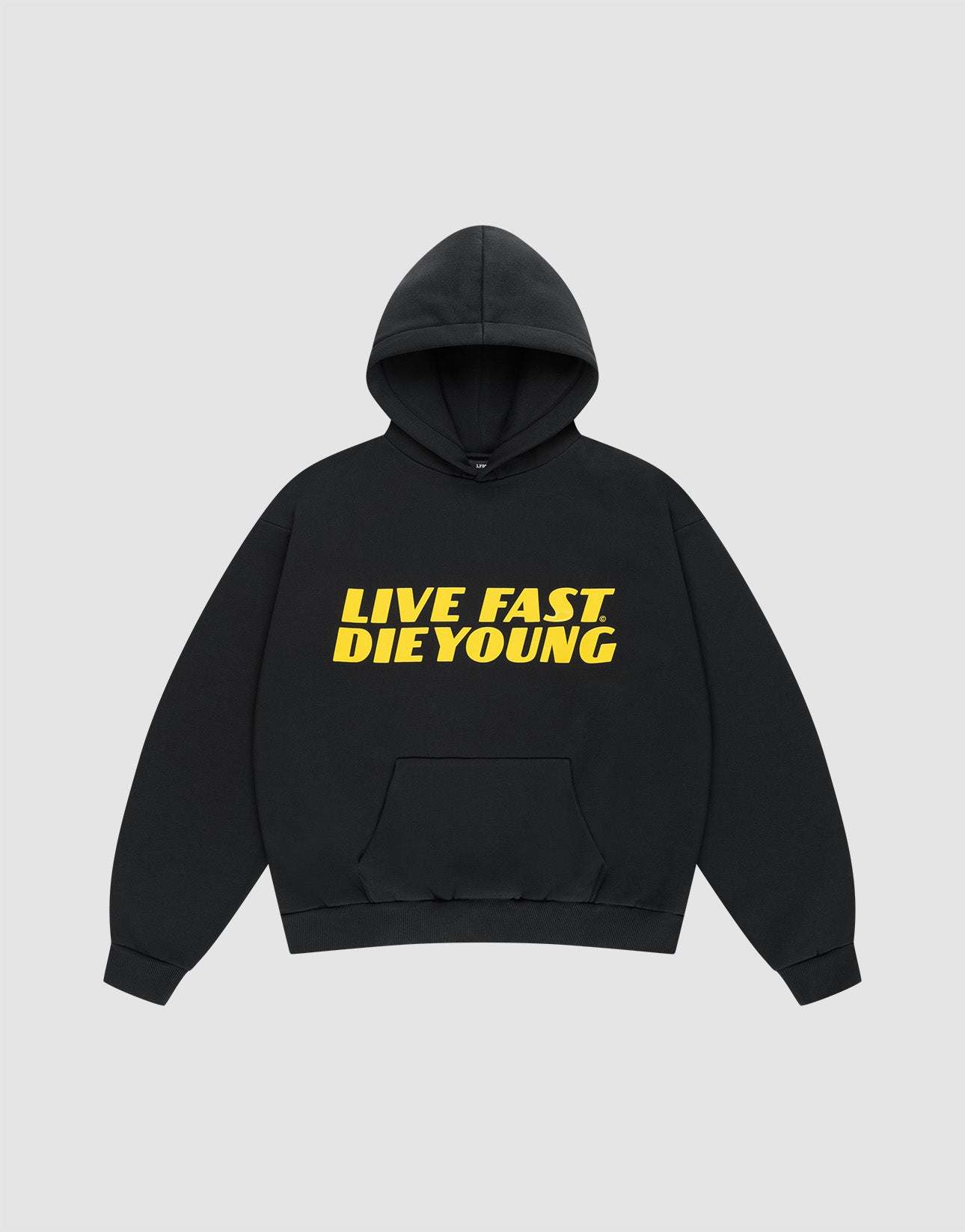 The LFDY Drift Hooded by LIVE FAST DIE YOUNG is a black oversized cotton hoodie with "LIVE FAST DIE YOUNG" in bold yellow across the chest and a double-layer hood, shown on a plain light gray background. | plain