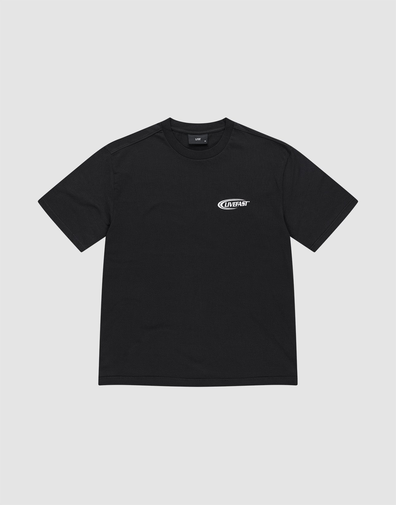 The LFDY Supply Tee by LIVE FAST DIE YOUNG is an oversized black short-sleeve t-shirt made from 100% Baumwolle, featuring a small white LIVE FAST logo on the left chest, shown against a plain light gray background.