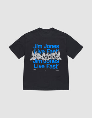 The LIVE FAST DIE YOUNG "Live Fast NY Tee" is an oversize-fit black cotton T-shirt featuring blue "Jim Jones Live Fast" text repeated twice and a white graffiti-style front print. The shirt is displayed flat on a light gray background. | plain