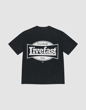 The LFDY Bulge Tee by LIVE FAST DIE YOUNG is a black oversized T-shirt made from 100% Baumwolle, featuring a bold white "Everybody Livefast Eats" rectangular backprint. | plain