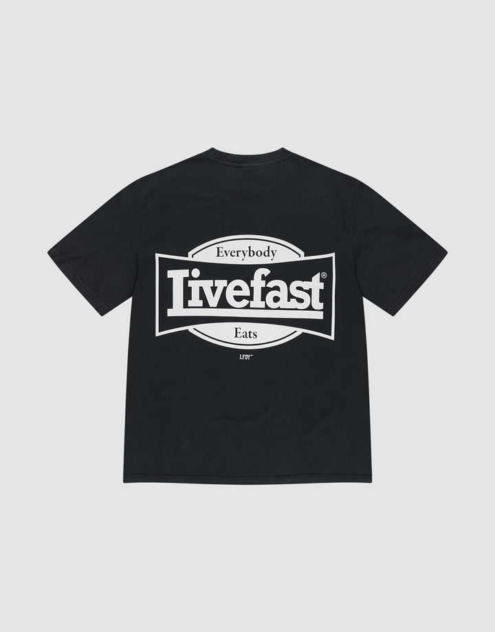 The LFDY Bulge Tee by LIVE FAST DIE YOUNG is a black oversized T-shirt made from 100% Baumwolle, featuring a bold white "Everybody Livefast Eats" rectangular backprint. | plain