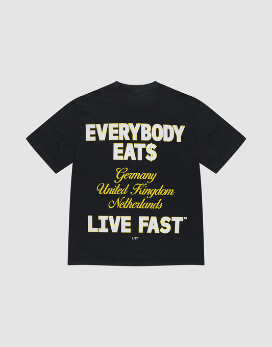 The Everybody Eats Tee by LIVE FAST DIE YOUNG is a black, 100% cotton oversize shirt with bold yellow and white front and back prints reading EVERYBODY EAT$, Germany, United Kingdom, Netherlands, and LIVE FAST™. | plain