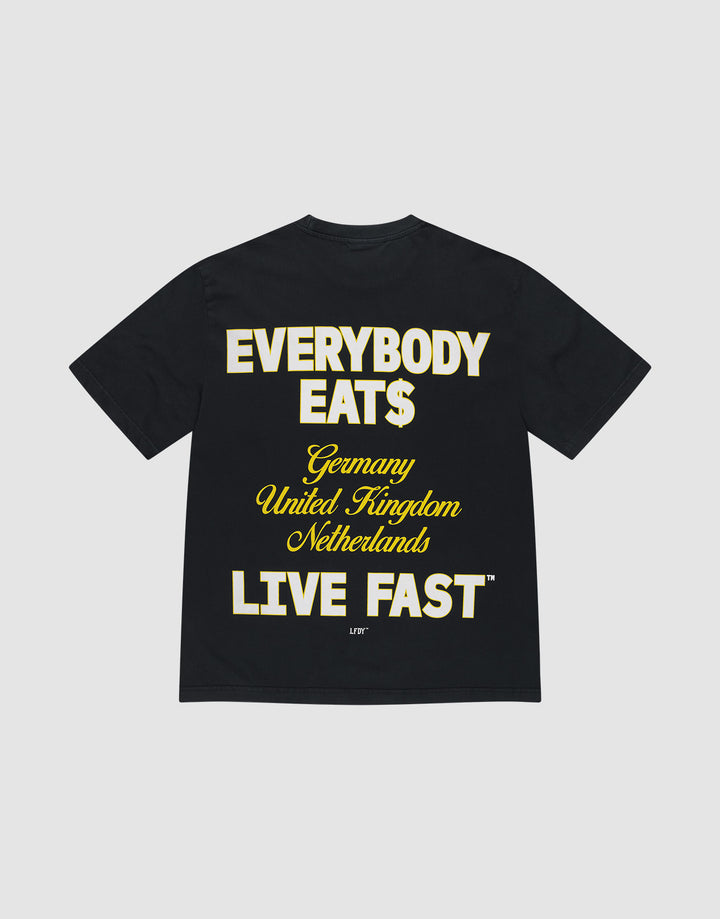 The Everybody Eats Tee by LIVE FAST DIE YOUNG is a black, 100% cotton oversize shirt with bold yellow and white front and back prints reading EVERYBODY EAT$, Germany, United Kingdom, Netherlands, and LIVE FAST™. | plain