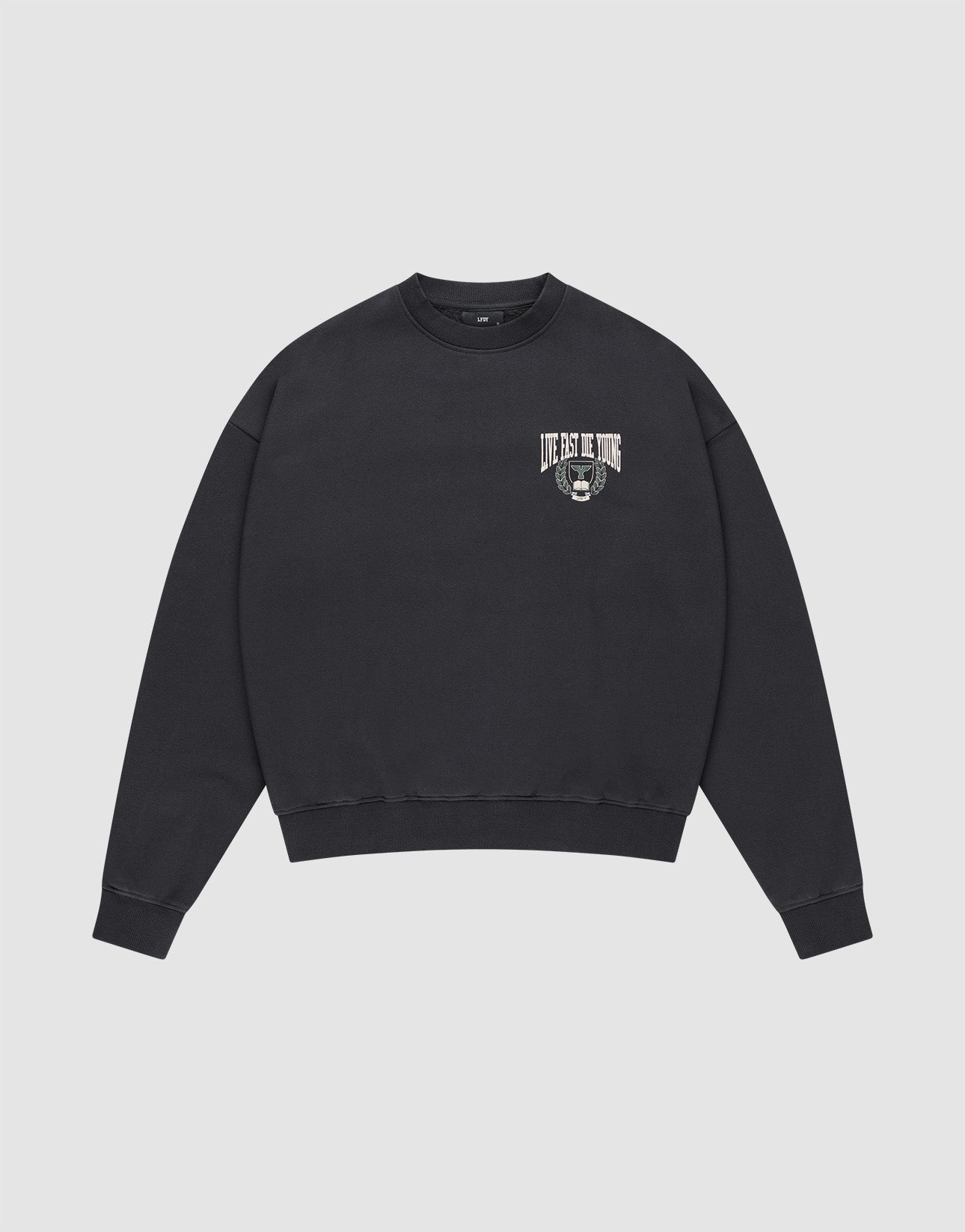 The Live Fast Die Young Chest Sweater by LIVE FAST DIE YOUNG is an oversized black crewneck with a subtle vintage effect. It features a small white “LIFE IS THE WAVE” chest print above a circular wave design, shown on a plain white background. | plain