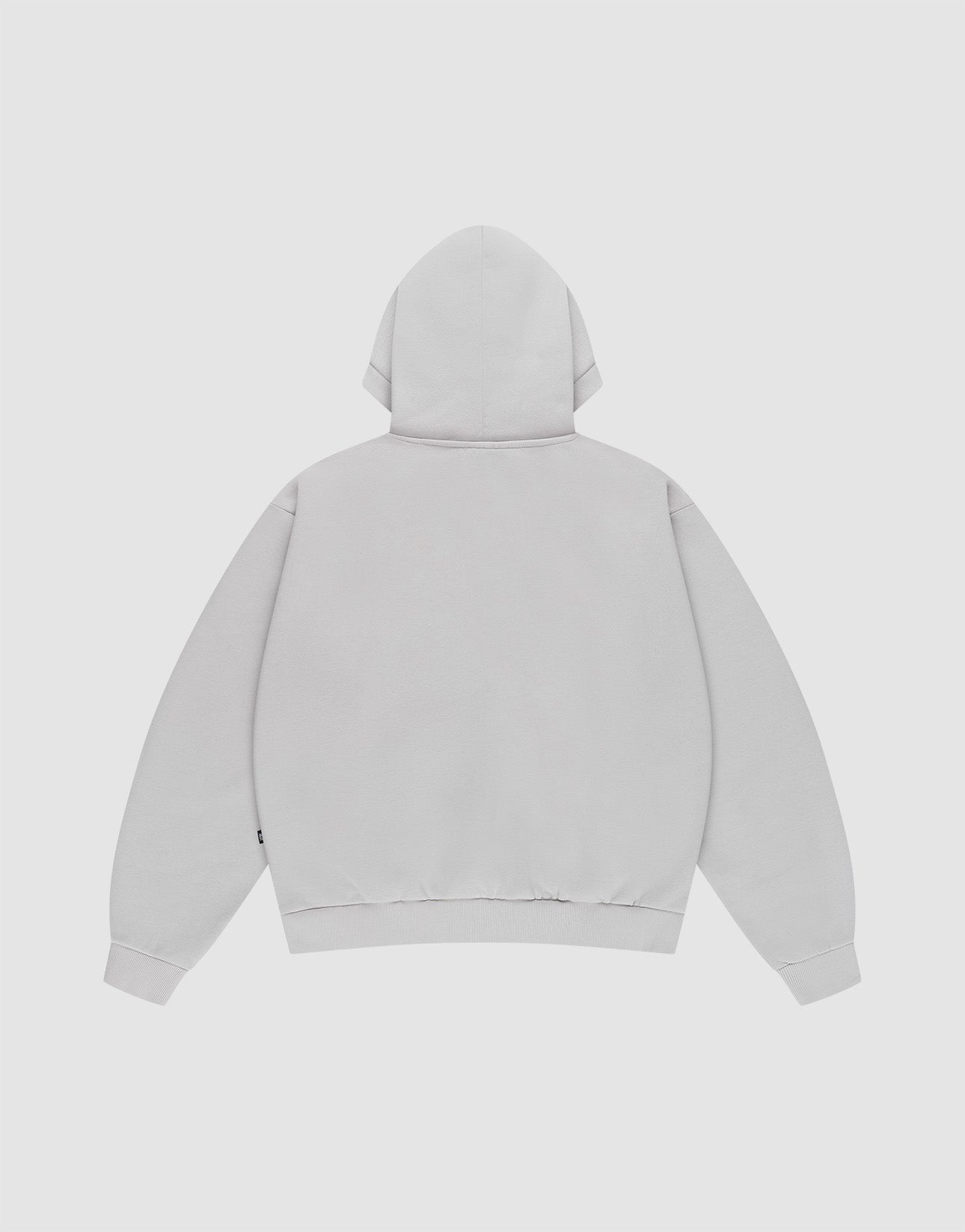 The LIVE FAST DIE YOUNG Basic Blank Hooded is an oversized, plain light gray sweatshirt with a hood, long sleeves, ribbed cuffs, and subtle topstitching. Made from soft Baumwolle for comfort. Shown from the back against a white background.