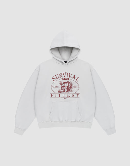 The LIVE FAST DIE YOUNG Survival Hooded is an oversize white cotton hoodie with a maroon bear front print, "Survival of the Fittest" across the chest, and a roomy front pocket. | plain