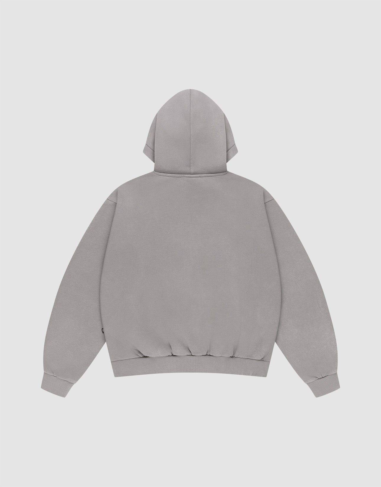 The LIVE FAST DIE YOUNG Basic Blank Hooded is a plain, light gray oversized hoodie with long sleeves, ribbed cuffs and hem, made from Baumwolle. Shown from the back against a white background.