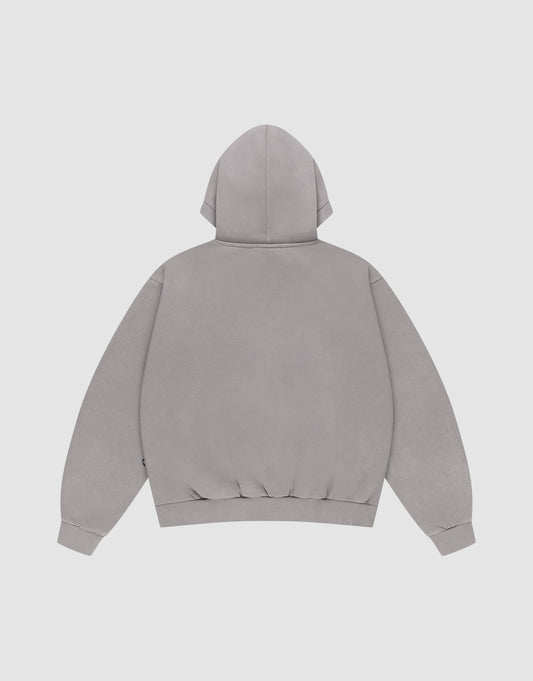 The LIVE FAST DIE YOUNG Basic Blank Hooded is a plain, light gray oversized hoodie with long sleeves, ribbed cuffs and hem, made from Baumwolle. Shown from the back against a white background.