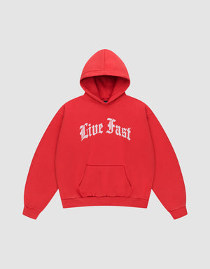 The LIVE FAST DIE YOUNG Live Fast Fractured Hooded is a red oversized hoodie with a doppellagige Kapuze, front pouch pocket, and bold white Old English "Live Fast" print. Made from soft cotton-polyester blend. Shown on a plain light gray background. | plain