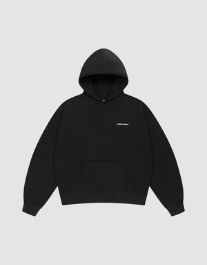 The Live Fast Plain Hooded by LIVE FAST DIE YOUNG is a black cotton hoodie with a front pocket and a small white "LVM PART" print on the left chest, shown against a light gray background. | plain