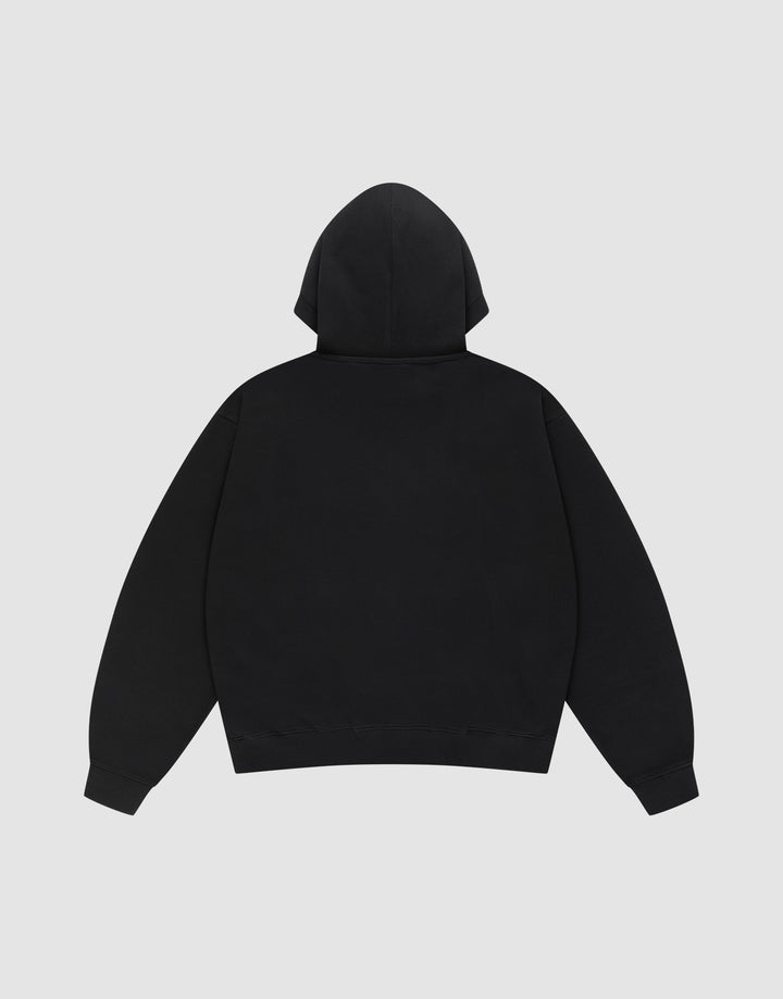 The Live Fast Plain Hooded by LIVE FAST DIE YOUNG is an oversize fit black hoodie made from soft cotton, featuring long sleeves, a hood, and ribbed cuffs and hem, shown from the back against a light gray background.