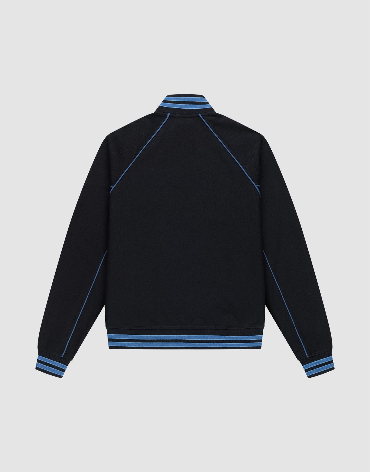 The LIVE FAST DIE YOUNG Live Fast Tracksuit Jacket is shown from the back in black with blue piping, Raglan sleeves, and blue striped cuffs, hem, and collar against a light gray background.