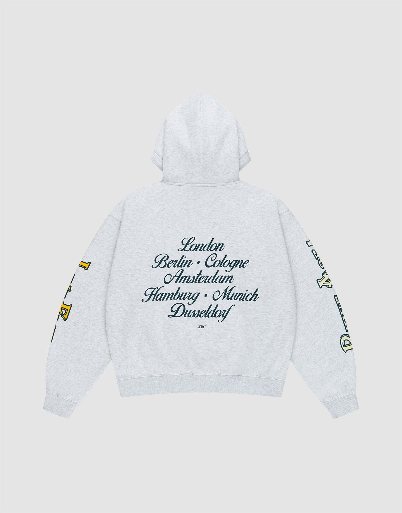 The LIVE FAST DIE YOUNG "Rhine Area Hooded" is a light gray oversized hoodie with drawstring hood, yellow and green sleeve prints, and black cursive European city names across the back.